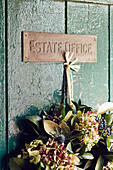 Floral wreath on door of Estate Office