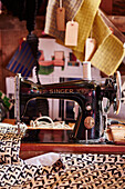 Sewing machine and fabric with samples in work studio of upholsterer