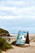 Advertising sign for King Surf at Mawgan Porth, Cornwall, UK