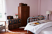 Vintage suitcases ad wardrobe in bedroom Lot et Garonne, France
