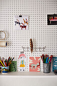 Pencils and postcards on artisan's desk Bridport, Dorset, UK