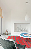 Whitewashed interior with 1960s style coffee table