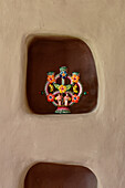 Mexican motif painted onto wall decoration