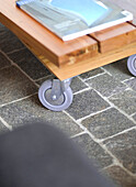 Caster wheels on wooden coffee table