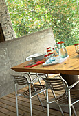 Tableware on outdoor dining and grill area