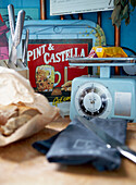 1950s style kitchen objects and bread in paper food wrapper