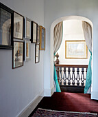 Interior hallway with artwork in Grade I listed Elizabethan manor house in Kent 