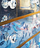 Oriental design on chest of drawers with glass handles