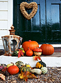 Edwardian school house front step with pumpkins and lantern