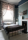 Black and white co-ordinated Georgian townhouse bedroom