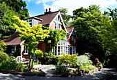 Front garden of detached house in Dorking Surrey England