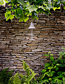 Garden ornament and dry stone wall
