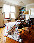 Fabric design on table in sunlit townhouse