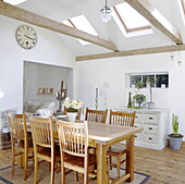 Open plan dining room with beamed ceiling in City of Bath Somerset, England, UK