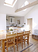 Open plan dining room with beamed ceiling in City of Bath Somerset, England, UK
