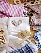 Alphabet letters and fabric samples in Durham family home England UK