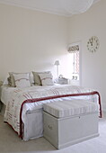 Cream bedroom with blanket box in country house Tunbridge Wells Kent England UK