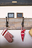 Vintage chalk boards and coat hooks in Brittany schoolhouse conversion France