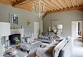 Light grey living room with corduroy sofas and ottoman footstool in Buckinghamshire home UK