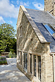 Terrace extension of detached 19th century stone-built house Northumberland, UK