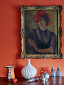 Framed artwork with case and jug in Speldhurst home Kent England UK