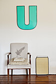 Tray and chair below letter 'U' in Country Durham home, North East England