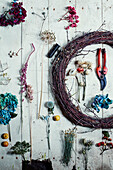 Cut flowers and tools for making a floral wreath in Radnorshire-Herefordshire borders, UK
