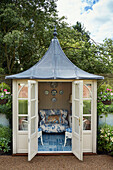 Summerhouse pavilion in Cotswolds garden, UK