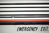 Emergency Exit sign on the outside of The Majestic bus near Hay-on-Wye, Wales, UK