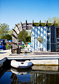 Converted shipping container on pontoon in Bedford marina, UK