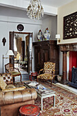 Antique furniture and patterned rug in Foix townhouse Ariege, France