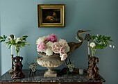 Still life with pink peonies on marble table