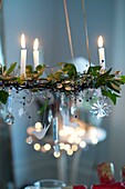 Christmas decoration with candles and mistletoe