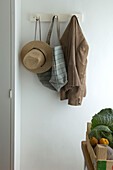 Coat rack on a kitchen wall