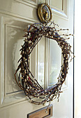 Christmas wreath hanging on a door