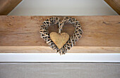Hearts on timber frame in Gloucestershire cottage England UK