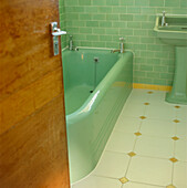 Art Deco style green tiled bathroom
