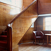 Art Deco wood wall panelled hallway and staircase