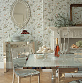 Contemporary pretty floral wallpapered dining room with lunch time table setting
