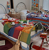 Child's twin bedroom full of opened gifts 