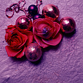 Red and pink flower and bauble Christmas decorations