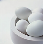 White bowl of white eggs