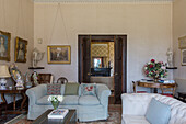 Drawing room with double doors in drawing room of historic Somerset country house UK