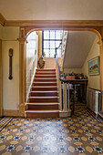 Victorian tiled main hall with staircase and mahogany stick barometer by by Jacob Abraham of Bath in historic Somerset country house UK