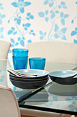 Blue glassware and bowls on dining table