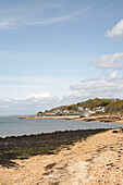Shingle beach at low tide in Gurnard on the Isle of White