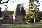 Modernised brick building set in own grounds, Kent, England, UK