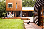 Wooden terrace and lawned exterior of Isle of Wight home UK