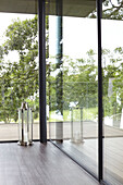 Glass balcony and pillar at exterior of modern Isle of Wight home UK