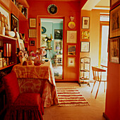 Red decor in warm sunny room